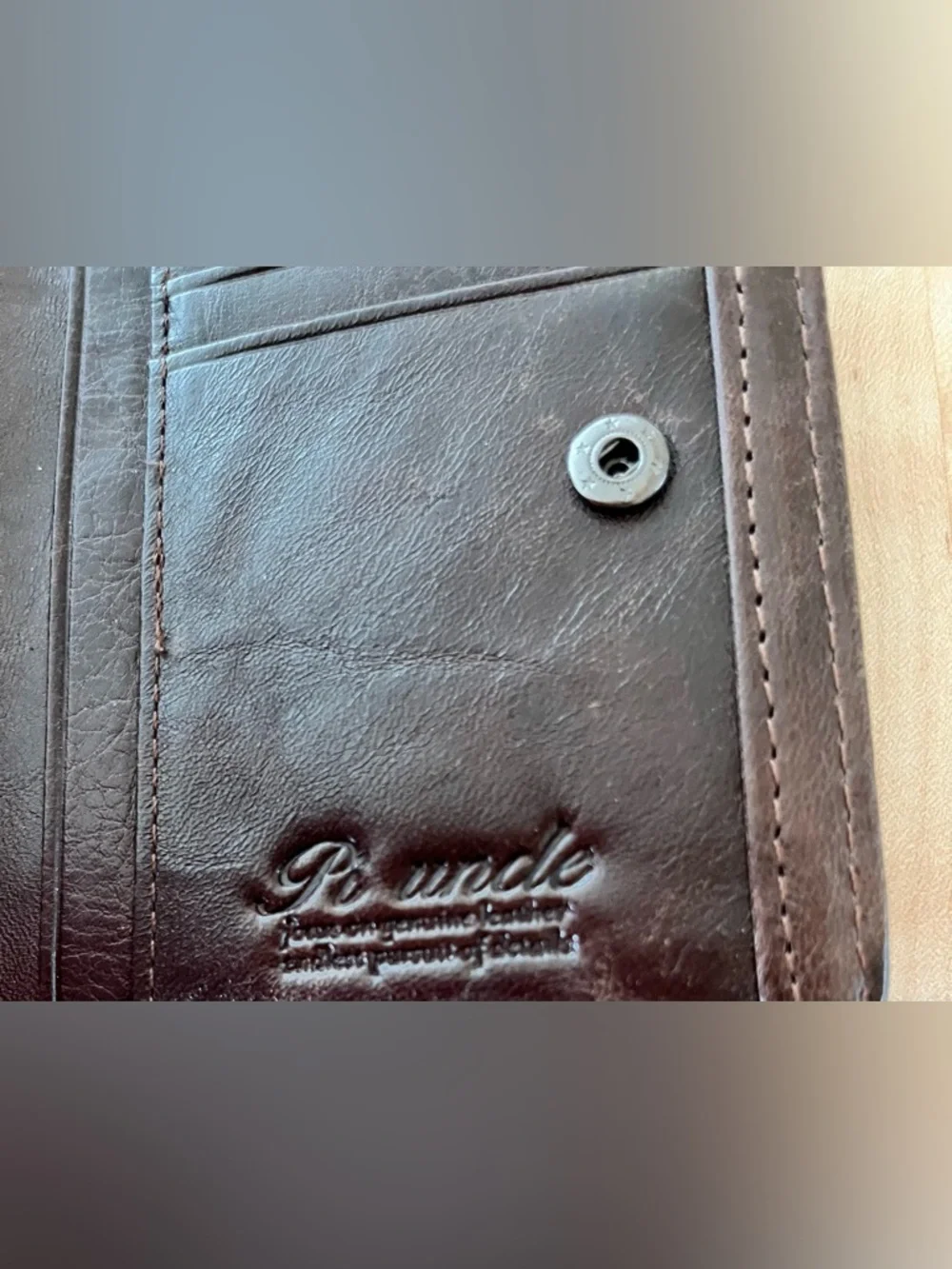 Pi uncle Embossed Brown Leather Zip Wallet